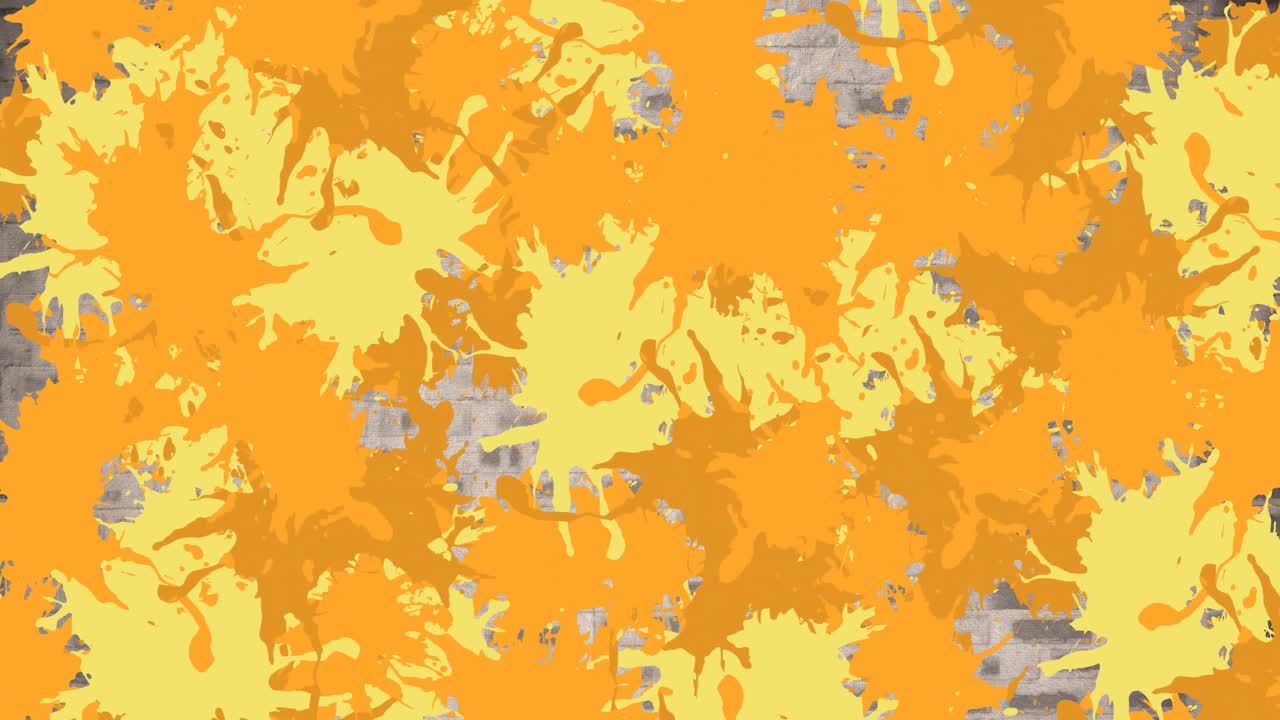 Animazione di diverse macchie colorate su un muro di mattoni