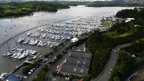 aerial view of bay of islands in new zealand , drone fly above port with sail boat in touristic destination on the island with luxury yacht