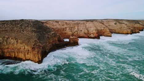 spectacular coastal cliffs and strong ocean waves near elliston, eyre peninsula, south australia