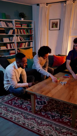 friends enjoying a game night at home