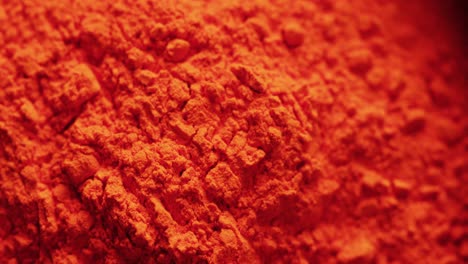Video-of-close-up-of-orange-powder-with-copy-space