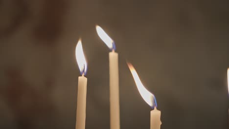 Candles shining and oscillating in Church
