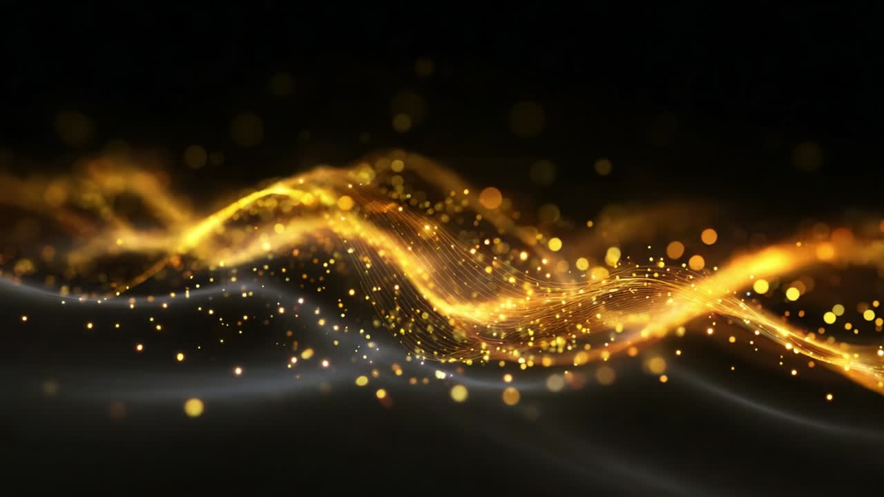 A mesmerizing display of golden waves illuminated by sparkling ...