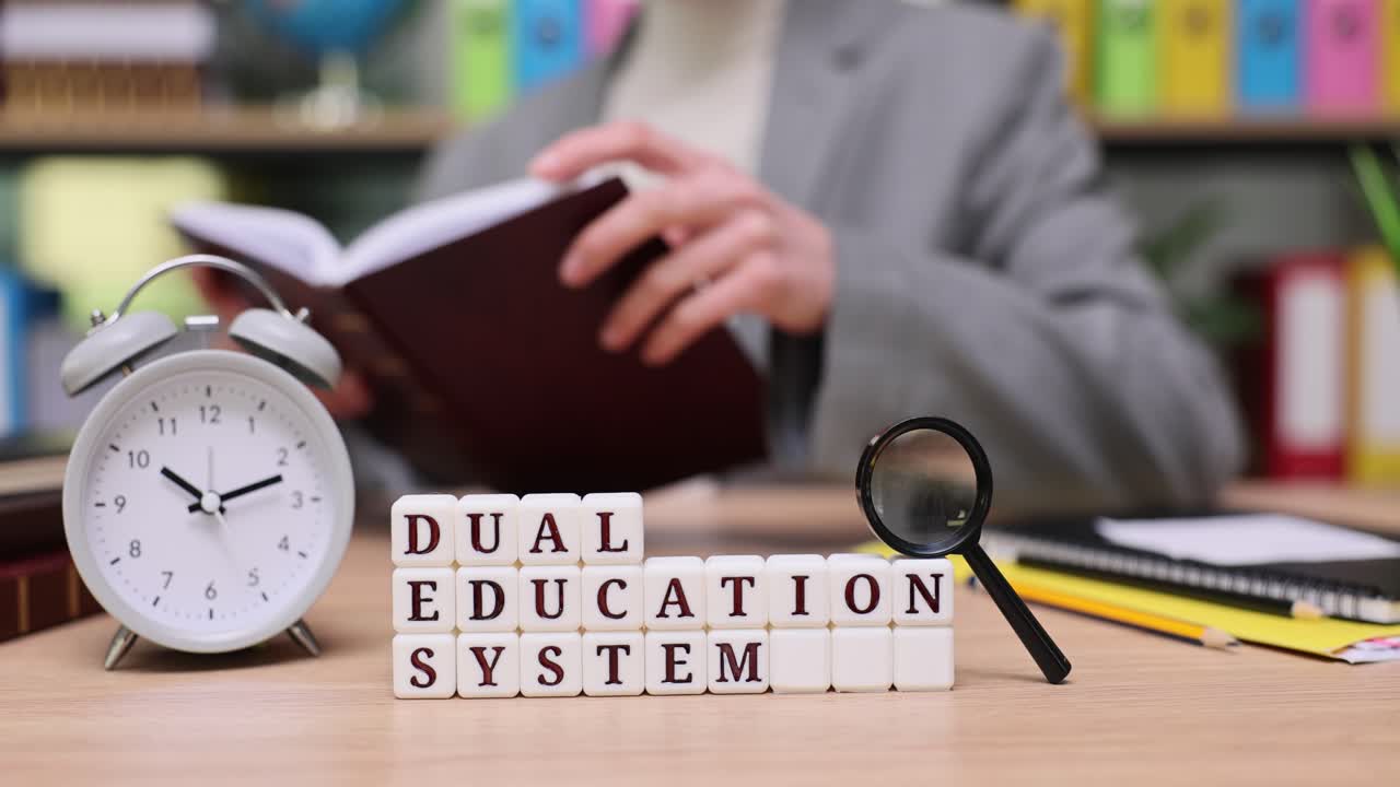Dual Education System with Alarm Clock and Magnifying Glass