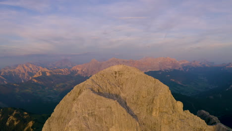 breath taking golden hour sunrise aerial view orbiting above south tyrol plose peitlerkofel epic mountain peak landscape