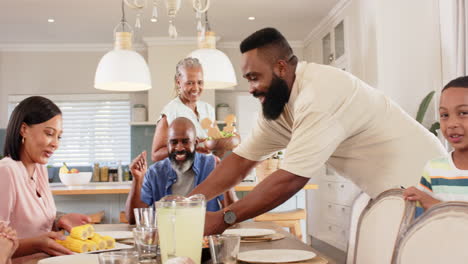 a diverse family gathered around dining table, smiling and interacting