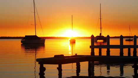 sailing boats and yachts floating on lake macquarie new castle
sunrise sunlight reflection over thje lake