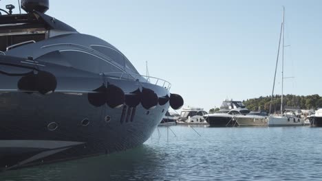 low angle shot of giant luxury yachts docking on croatian pier during summer