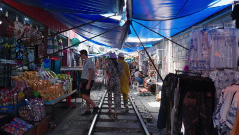 bangkok street market on train tracks