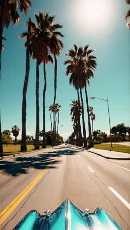 a dynamic, low-angle video shot captures a classic car cruising down a palm-lined boulevard