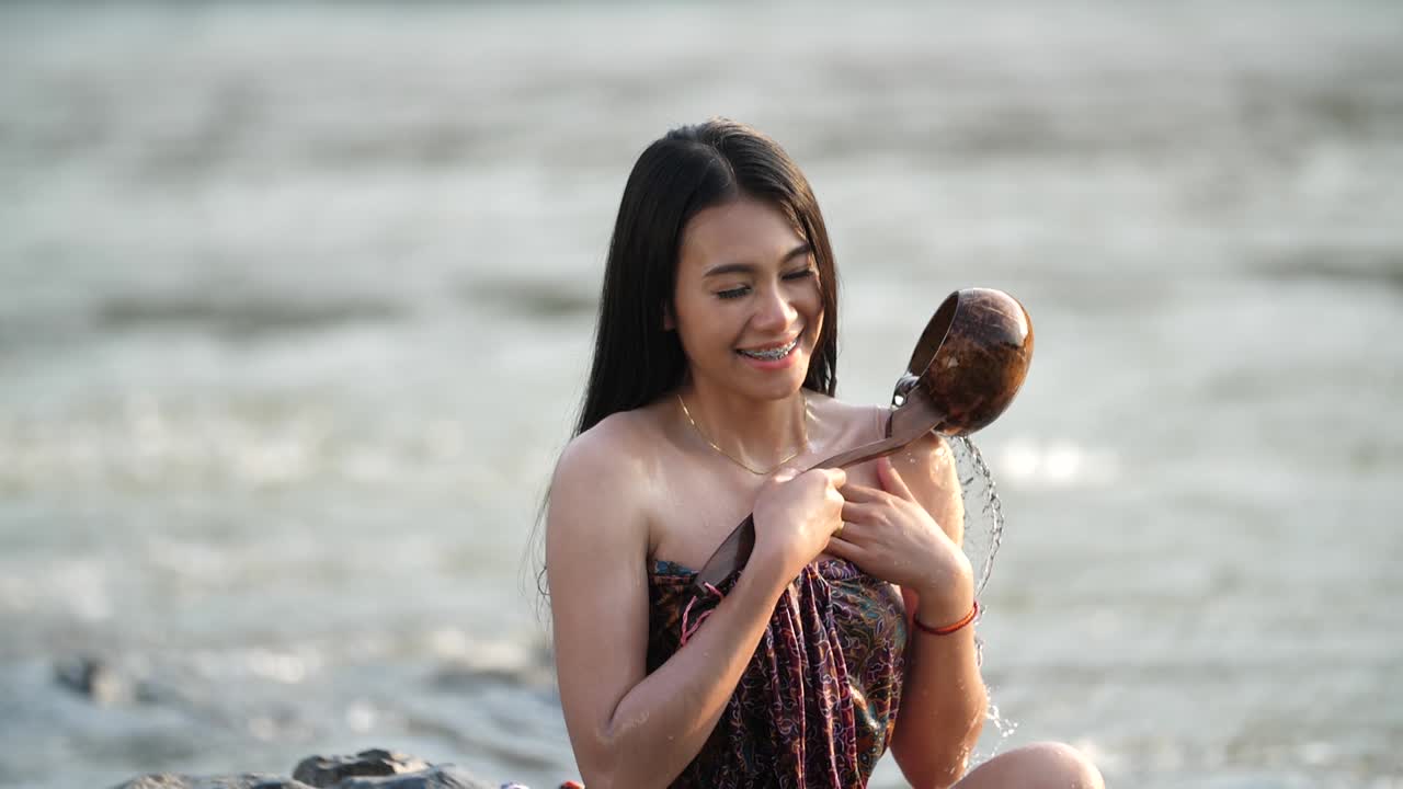 Woman Bathing in a River