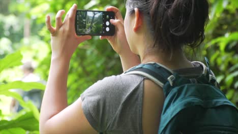 Backpacker-Hiker-takes-picture-of-scenery-in-Hawaii-shot-in-slow-motion