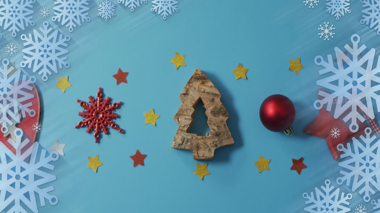 animación del patrón de copos de nieve de navidad sobre las decoraciones de navidad