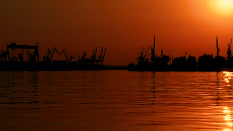 beautiful orange sky at sunset with a view of the harbour