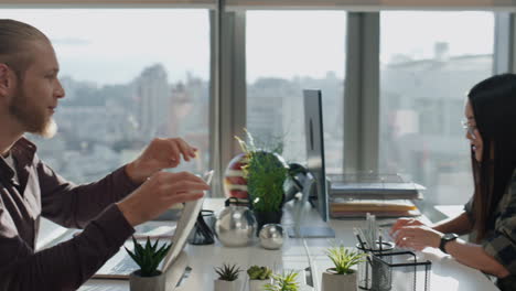 positive man gesturing office closeup. happy colleagues discussing emotionally