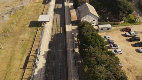 aerial flyover empty train station in buenos aires during covid-19 pandemic lock down