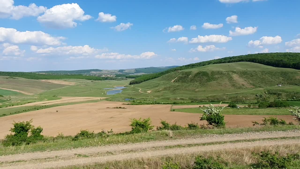 Filming in nature  a large plain with variety colors
