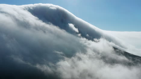aerial of lion's head covered in clouds in cape town (table cloth)