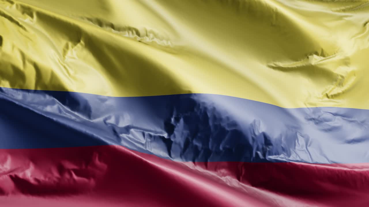 Colombia flag waving on the wind loop. Colombian banner swaying on the breeze. Full filling background. 10 seconds loop.