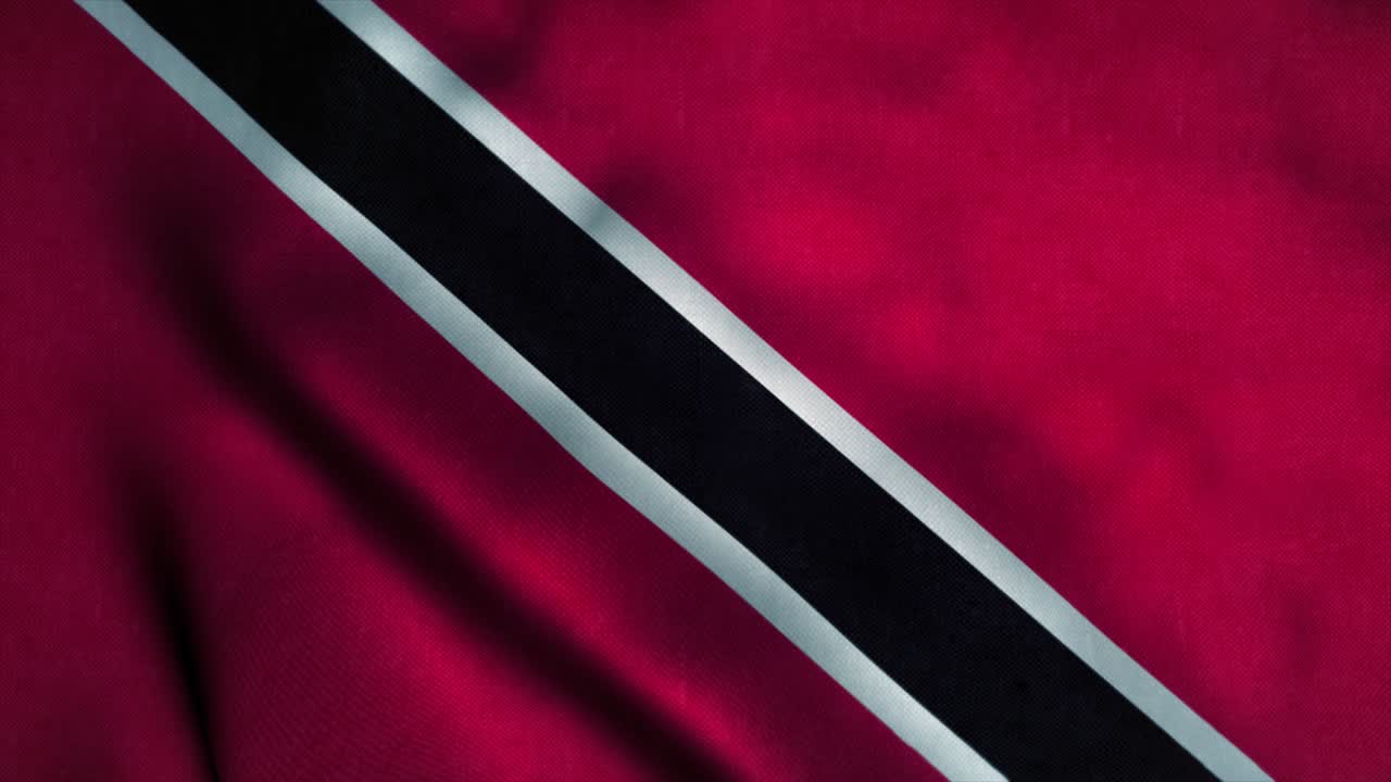 Trinidadin ja Tobagon lippu liehuu tuulessa. Trinidadin ja Tobagon kansallislippu. Trinidadin ja Tobagon tunnus saumaton silmukka-animaatio. 4K