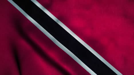 la bandera de trinidad y tobago ondeando en el viento. la bandera nacional de trinidad y tobago. el signo de trinidad y tabago animación de bucle sin costuras. 4k