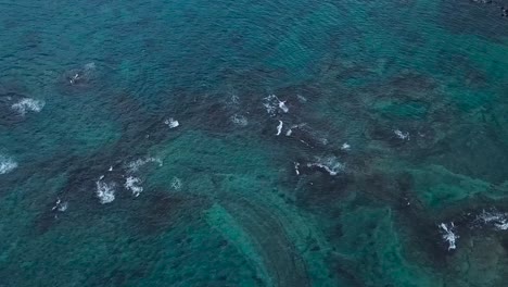 drone aerial beach pan up ocean hawaii