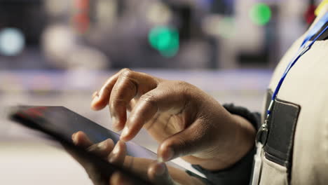 vertical video close up of engineer in industry 4.0 plant designing robotic production lines