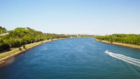 drone flight over cape cod canal towards the steel arch sagamore bridge