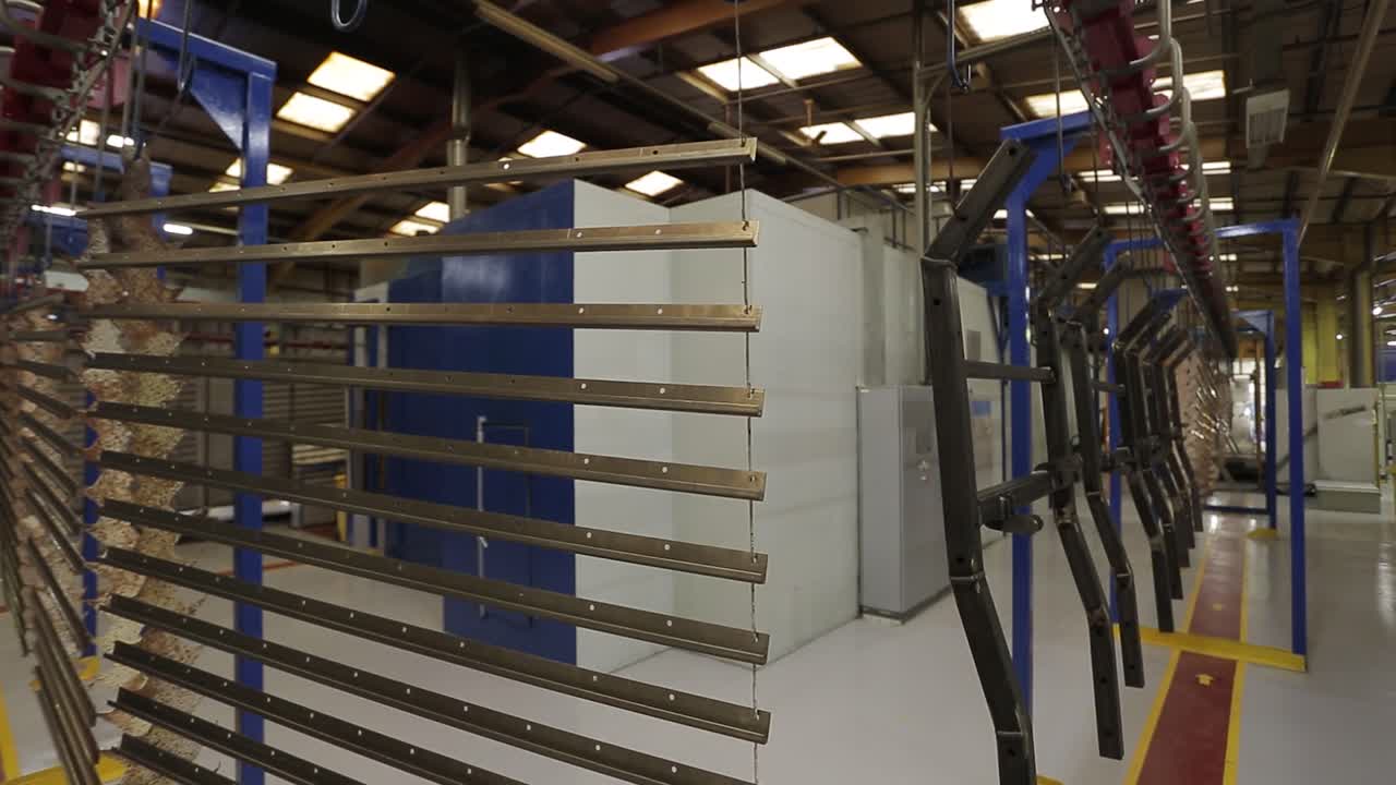 Wide shot of a powder coating line