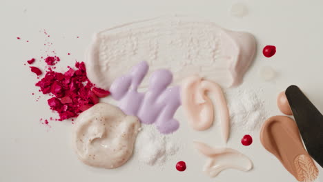 various skincare and makeup products swatches