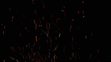 many-long-sparks-flying-upwords-very-fast-with-black-background