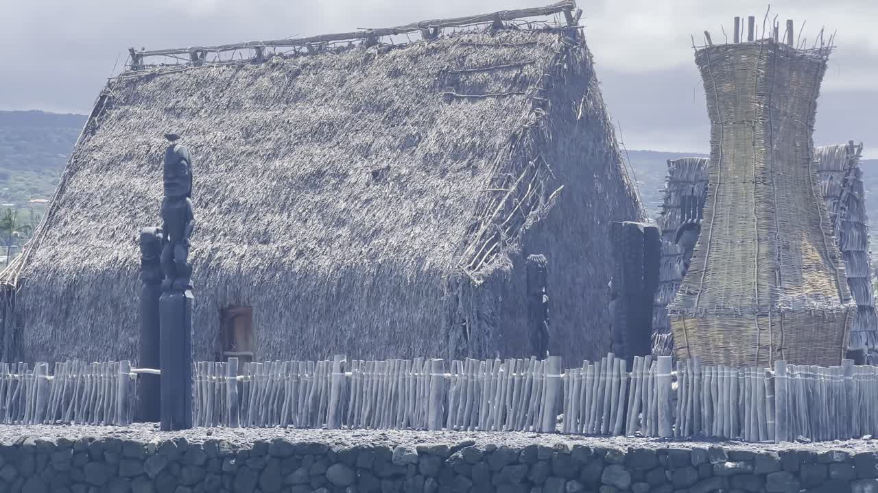Cinematic close-up panning shot of the historic Kamakahonu House in Kailua-Kona on the Big Island of Hawai'i