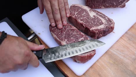 preparing a rib eye steak