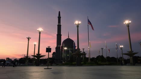 sillhouette of putra mosque at putrajaya, malaysia in the evening during sunset