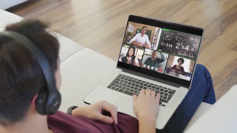 Animation-of-asian-boy-in-headphones-having-online-lessons-on-laptop-at-home