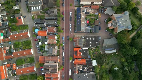 Birds-eye-view-of-a-european-car-driving-on-public-roads