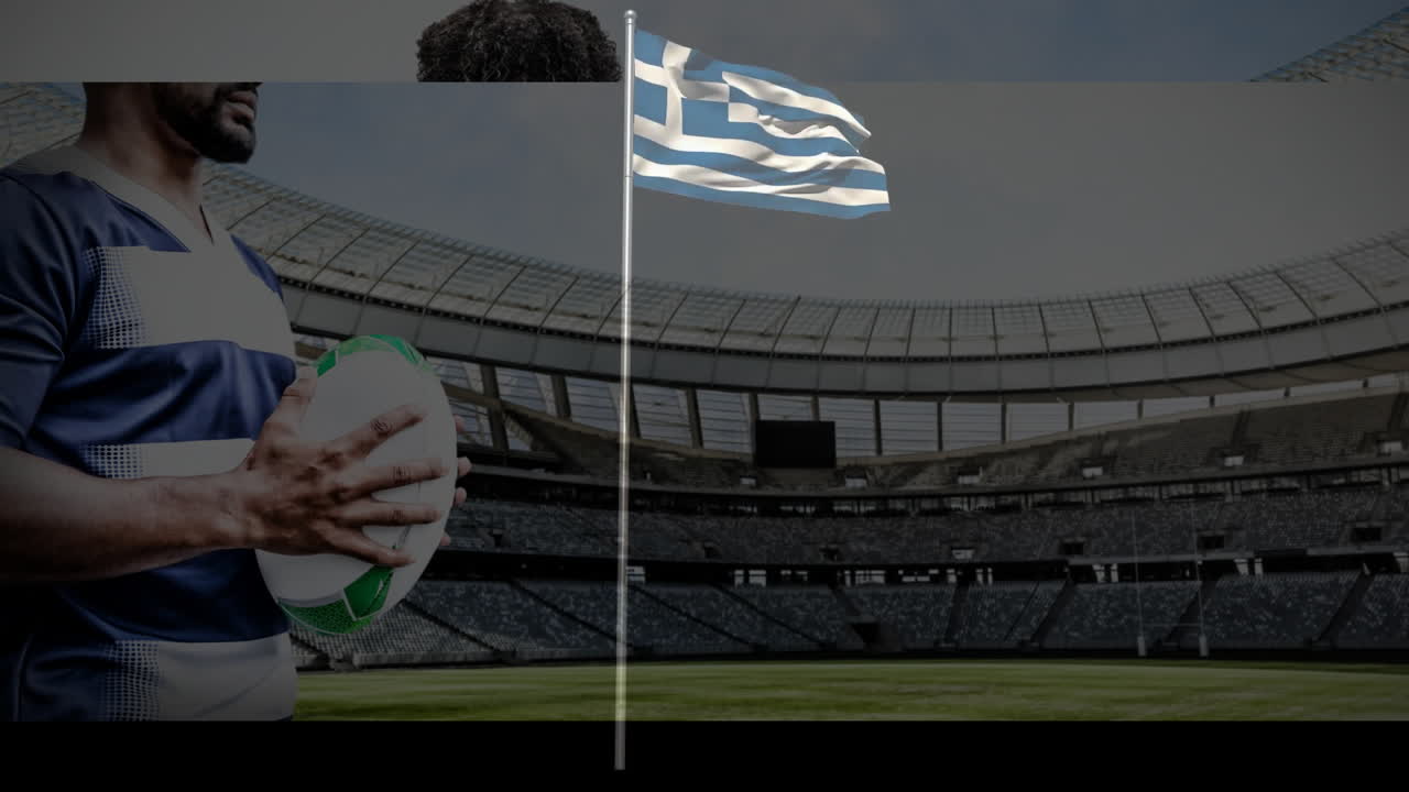 Holding rugby ball, player in stadium with Greek flag waving in background