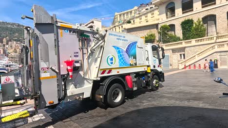 garbage truck operating in monte carlo, monaco