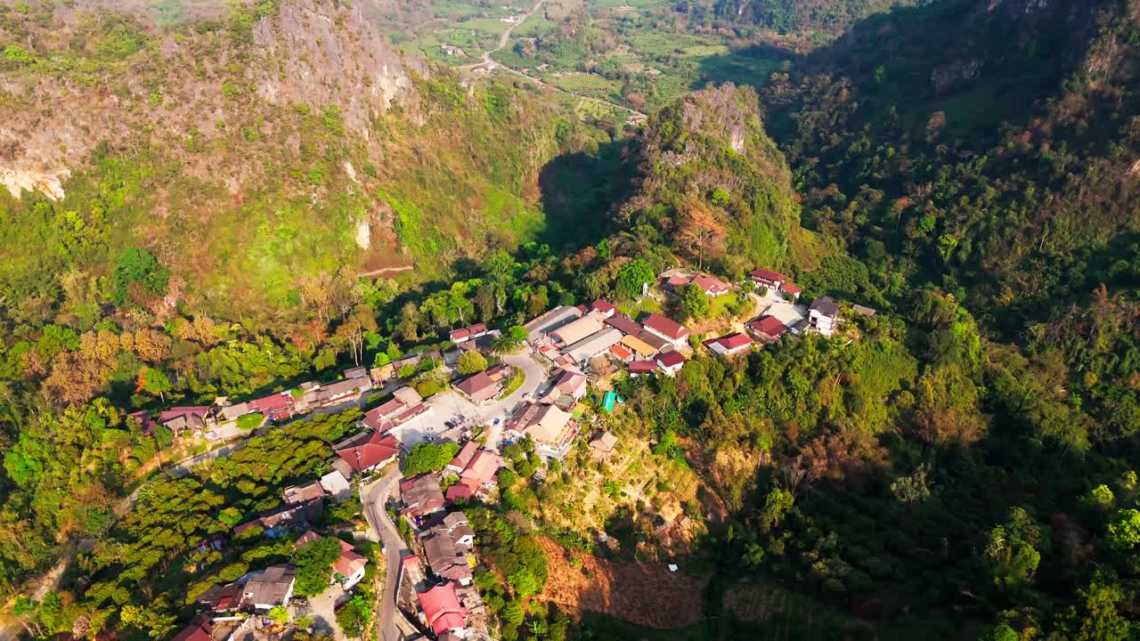 Drone fly above doi Pha Mi scenic mountains village in Mae sai city northern of Thailand Chiang rai province