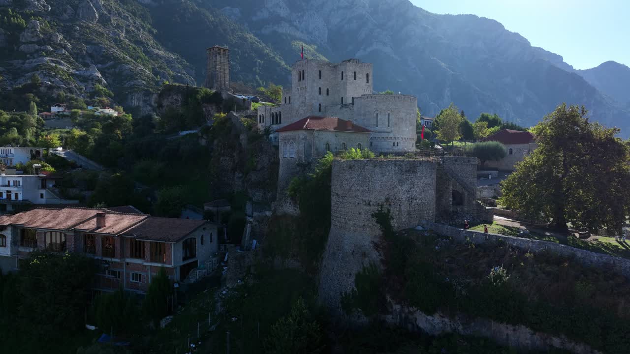 Scenic view of the ancient Scanderbeg Castle nestled in the mountains of Kruja, Albania, showcasing its historical architecture.