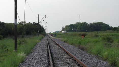 South-African-workers-carry-firewood-home-along-abandoned-railway-line