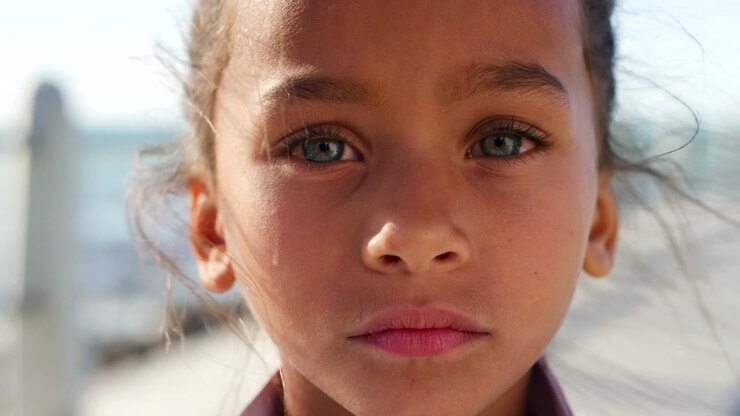 Close-up Portrait of a Young Girl with Striking Eyes
