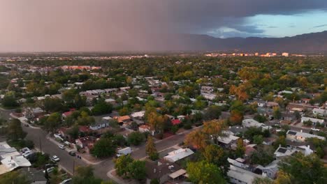 Summer-thunderstorm-rolling-in-over-mountains-in-southwest-USA-towards-housing-development