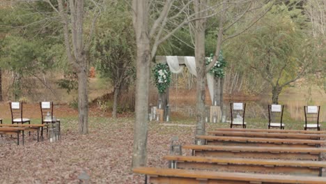 beautiful rustic outdoor ceremony venue in the back yard during the fall season at bean town ranch in ottawa