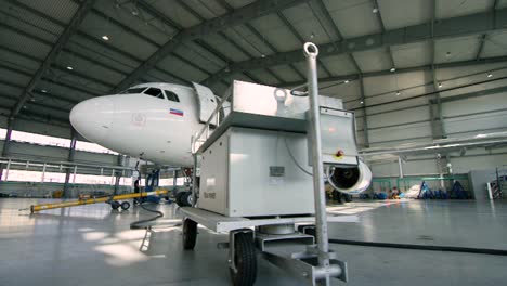 airplane maintenance in a hangar