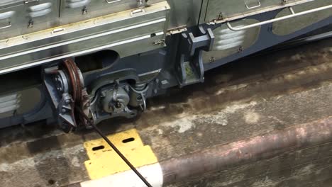 close-up of the cable system of the locomotive while is pulling the ship at panama canal locks