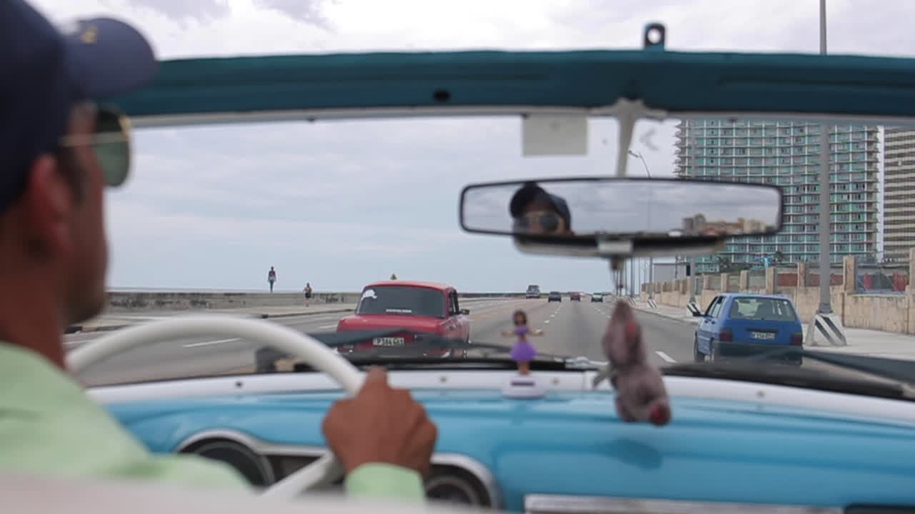 Driving classic cars in Havana, Cuba