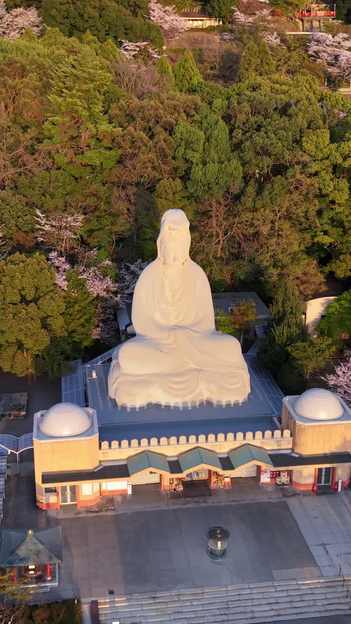Aerial drone view of the Ryozen Kannon Temple in daylight in Kyoto, Japan