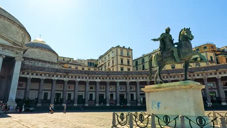 visitors admire architecture and statues in naples