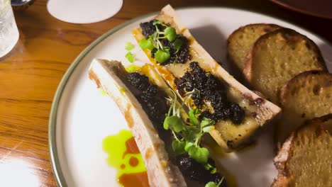 delicious bone marrow toast with garnishes